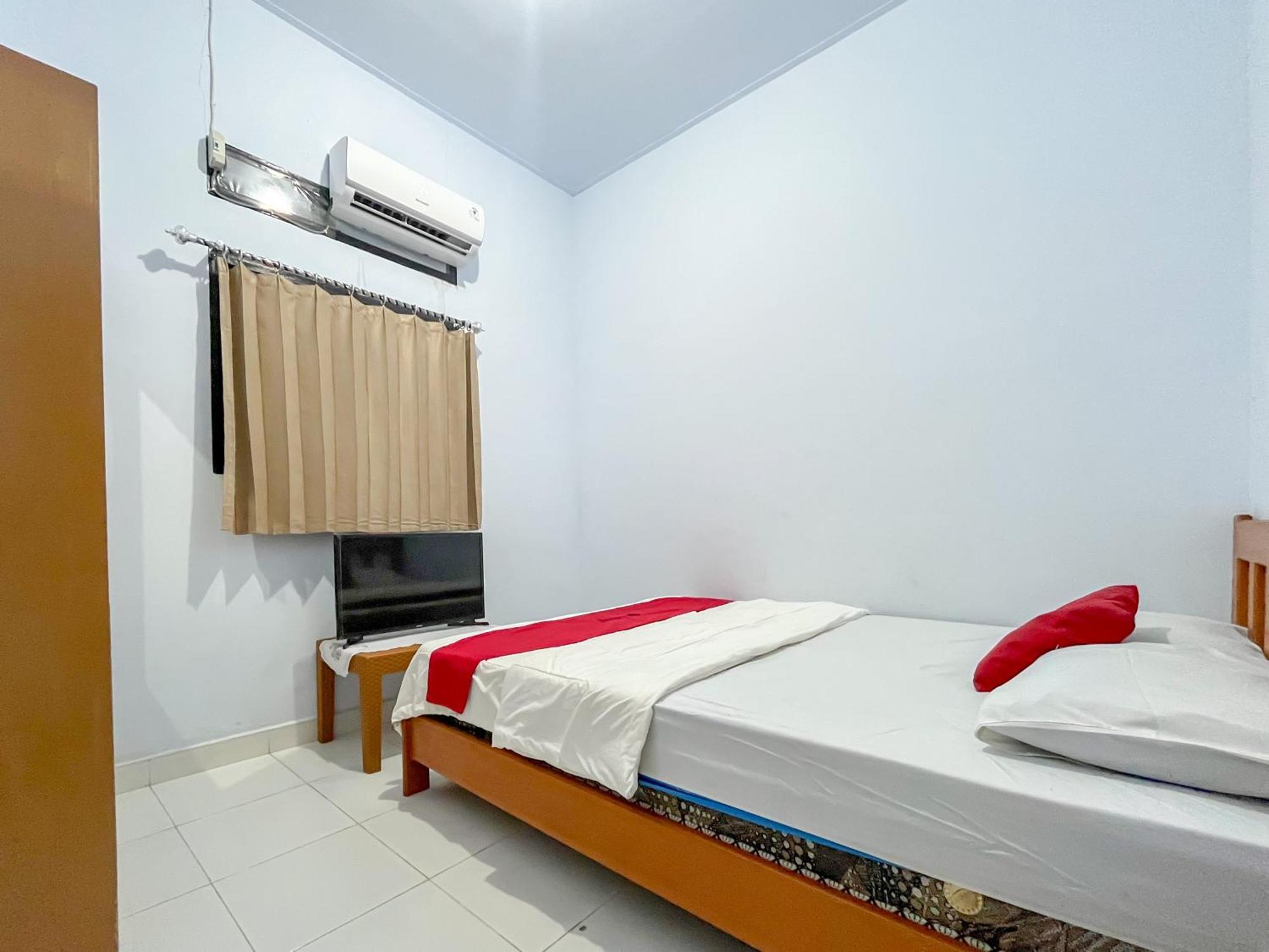 Reddoorz Syariah At Home Ampana Guest House Ampana Kota المظهر الخارجي الصورة